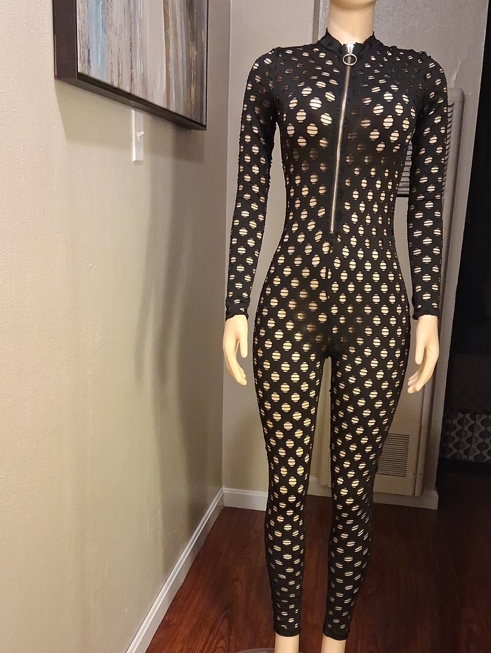Black Long-Sleeve Cutout Zip-Front Jumpsuit by Kanari B